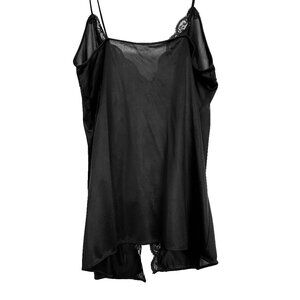 Delicate Black spaghetti-strap camisole undergarment trimmed in black lace.